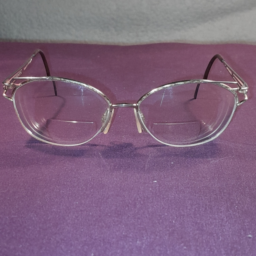 Ladies custom eyeglasses. Bifocal- must replace with personal prescription.